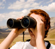 boy using binoculars