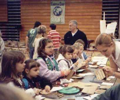 photo: Local Girl Scouts participate in a water education workshop at Earth Day Exposition 2002 at Buffalo State College