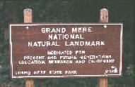 sign showing characteristics of the Grand Mere National Natural Landmark