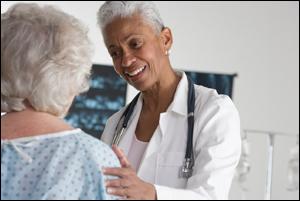 Photo of doctor with patient