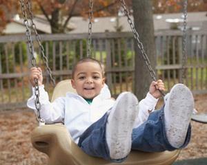 kid on a swing