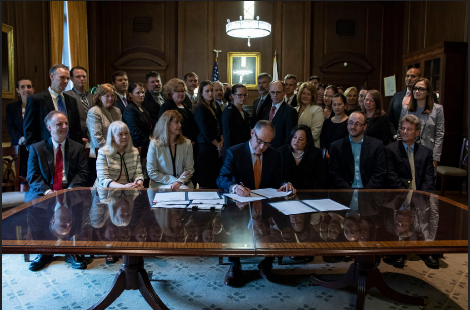 EPA Administrator Pruitt signs agency action documents under TSCA to mark the second anniversary of the Lautenberg Act, June 2018.