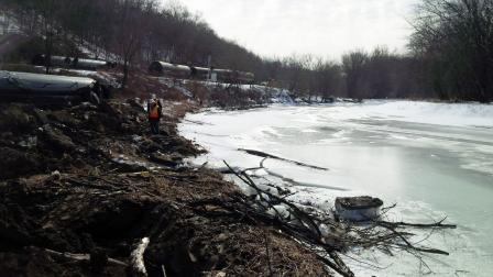 EPA has taken samples from the Galena River next to a crude oil freight train derailment.
