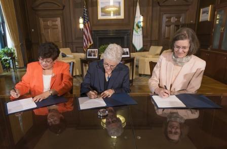 EPA and NHMA signing an MOU