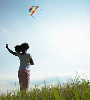 Child flying a kite