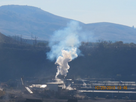 October 2013 photo showing air pollution emissions from PNW Wind Down LLC, formerly Omak Wood Products, violating federal clean air rules on the Colville Reservation in Omak, Washington.