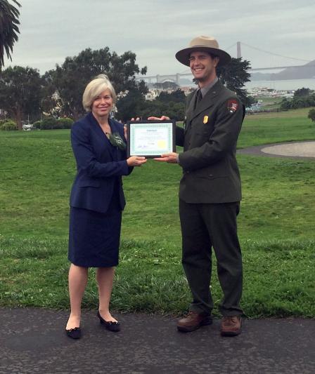 Acting Deputy Regional Administrator Deborah Jordan presents Aaron Roth, Acting Superintendent, Golden Gate Natural Recreation Area, with the Federal Green Challenge Energy Award.
