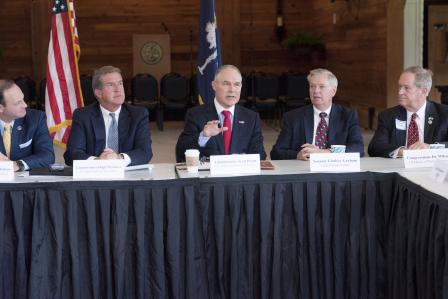 Administrator Pruitt speaking form a table with four men including U.S. Sen Lindsey Graham