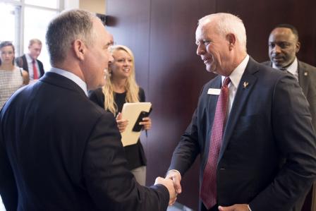 EPA Administrator shaking hands with Marvin Childers, President of The Poultry Federation