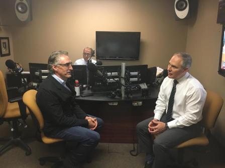 North Dakota Governor Doug Burgum (left) and EPA Administrator Scott Pruitt (right) talk before joint interview on Flag 1100 AM with Scott Hennen.
