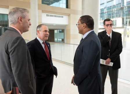 EPA Administrator Scott Pruitt (second from left) speaks with Toyota's Tom Stricker (left), Chris Reynolds (second from right), and Doug Beebe (right). 