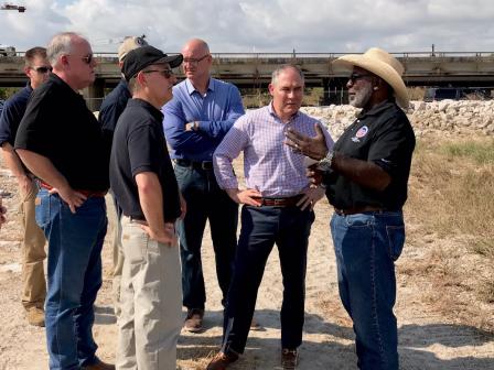Administrator Pruitt, standing out side at the San Jacinto Superfund site talking with EPA Acting Regional Administrator for Region 6, Samuel Coleman. 