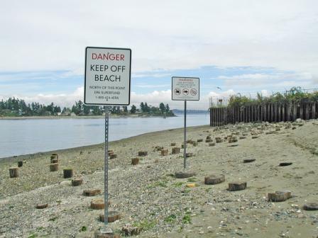 Wyckoff-Eagle Harbor Superfund Site creosote hazards beach warning signs on Bainbridge Island, Washington