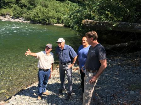 (From left) EPA staff John Hillenbrand and EPA Regional Administrator Mike Stoker survey the Trinity River near Copper Bluff Mine with Ken Norton, Director of the Hoopa Tribal Environmental Protection Agency, and Mark Higley, Tribal Wildlife Biologist.
