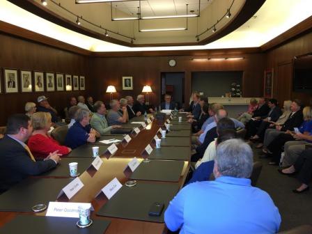 Wheeler at roundtable with others discussing ag issues.