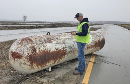 image of orphaned tank in 2019 Iowa flood zone