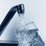 Glass being filled with tap water