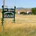 The Hikels -- Christina Farm sign. Grassland/rangeland, haying and farmsteads