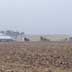 Large farmstead with biplane