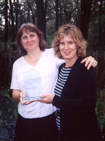 6: Margaret Frick, on the left, and Shelia Brown, on the right, also won the 2002 Galveston Bay Estuary Stewardship Award.