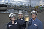 Business Category - 1st Place: Examining the ExxonMobil Baton Rouge Refinery's treated wastewater are (l-r) Engineers Meredith Moe, Sarah Jones and Plant Supervisor Gary Bailey.