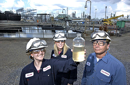 Examining the ExxonMobil Baton Rouge Refinery's treated wastewater are (l-r) Engineers Meredith Moe, Sarah Jones and Plant Supervisor Gary Bailey.