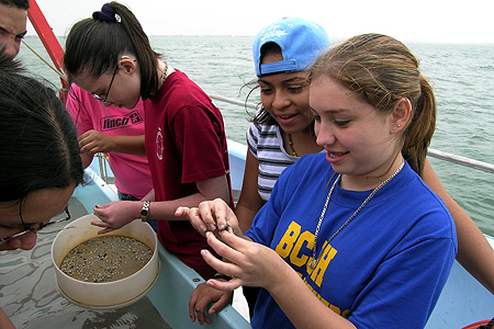Photo by Carrie Robertson: Multicultural Education Science & Spanish Club Network- Middle school students from the Gulf of Mexico Foundation Science and Spanish Club Network participate in a science field trip aboard a research vessel for a hands-on investigative cruise. The Science and Spanish Club Network, organized and sponsored by the Gulf of Mexico Foundation, is funded by grants from the Texas General Land Office, National Oceanic and Atmospheric Administration, and the Environmental Protection Administration.
