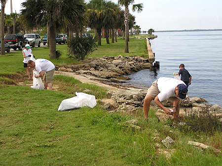 US Marines lead a shoreline clean-up effort.