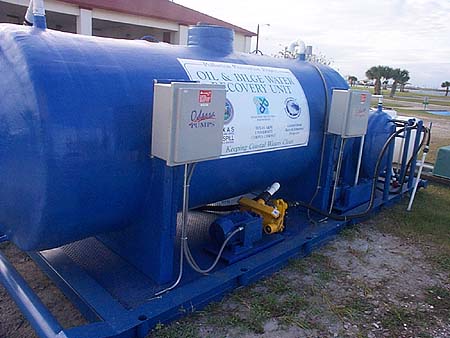 Six units were constructed and installed at area harbors and marinas.
 This is one of the self-contained units which included a 2000 gallon
bilgewater tank, a 300 gallon waste oil tank, and associated pumps and
hoses all on one skid.