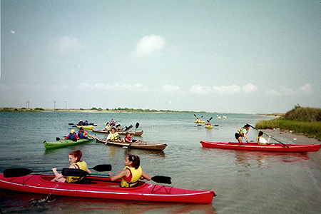 Summer campers receive kayak instruction in the Unversity swimming pool and then get to explore a variety of coastal locations.