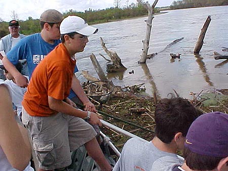 Students from teacher Diane Rabalais' eight grade Science Club at Fontainebleau Junior Hi clean the Pearl River of discarded trash and refrigerators illegally dumped in the Pearl River Wildlife Management Area.