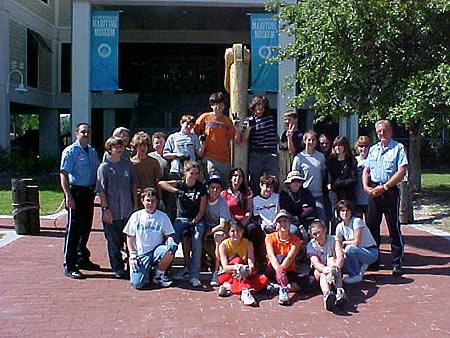 Earth Protectors class of eight graders at Madisonville Jr. Hi in our Junior Ranger Corps posing before the Lake Pontchartrain Basin Maritme Museum before cleaning up trash dumped along Lake Rd. and the Tchefunct River in the Madisonville Marsh.