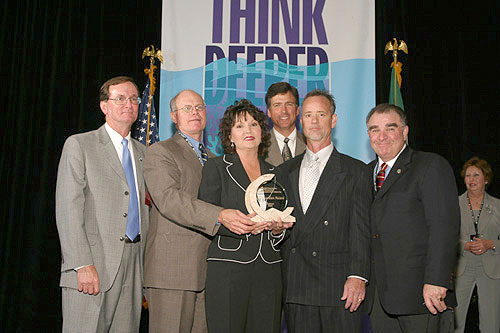 Presentation of the Gulf Guardian Award for Business, 1st Place, to Mississippi Power, Plant Jack Watson for their project Household Hazardous Waste Collection Day.  From left, Dr. Bill Walker; Phil Bass; winner Cynthia Simmons; Bryon Griffith, Director of the Gulf of Mexico Program; winner Jay O'Neal; and Jimmy Palmer, EPA Region 4 Administrator.