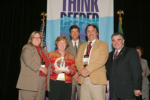 Presentation of the Gulf Guardian Award for Youth/Education, 1st Place, to West Florida Regional Planning Council/Bay Area Resource Council for their project Resource Rangers Environmental Club.  From left, Colleen Castille; winner Eleanor Godwin; Bryon Griffith, Director of the Gulf of Mexico Program; winner Glen Griffith; and Jimmy Palmer, EPA Region 4 Administrator.