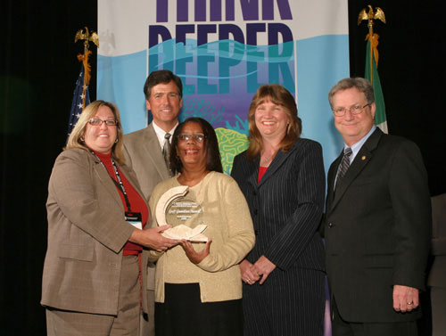 Presentation of the Gulf Guardian Award for Youth/Education 2nd place, to J.S. Robinson Elementary School/ Suncoast Earth Force of St. Petersburg, Florida. From left, Colleen Castille, Bryon Griffith of the Gulf of Mexico Program, winners Chequittea Lumpkins and Judy Der, and Mayor Richard Greene, EPA Region 6 Administrator.