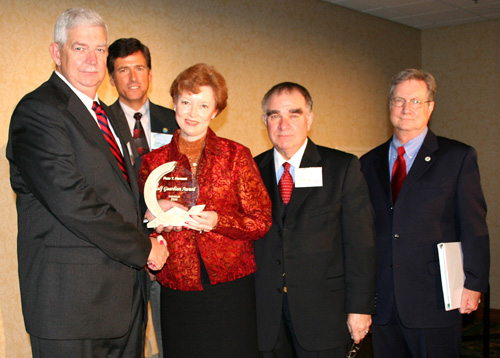 Presentation of the Gulf Guardian Award, 1st place, Individual, to Pam T. Henson, for her work in environmental education and as Director of Instructional Support/Baldwin Co. Board of Education. From left to right, pictured are David Yeager, Gulf of Mexico Program Director Bryon Griffith, Pam Henson, EPA Region 4 Administrator Jimmy Palmer, and EPA Region 6 Administrator Richard Greene.