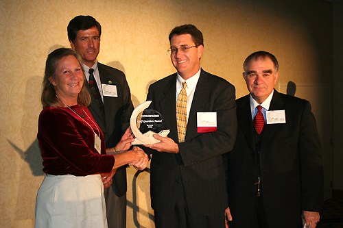 Presentation of the Gulf Guardian Award, 2nd Place, Business, to Manatee County Port Authority/Gulfstream Natural Gas System for their project, "Port Manatee Seagrass Mitigation and Environmental Enhancement". From left to right, pictured are Judy Ott, Gulf of Mexico Program Director Bryon Griffith, George Isiminger, and EPA Region 4 Administrator Jimmy Palmer.