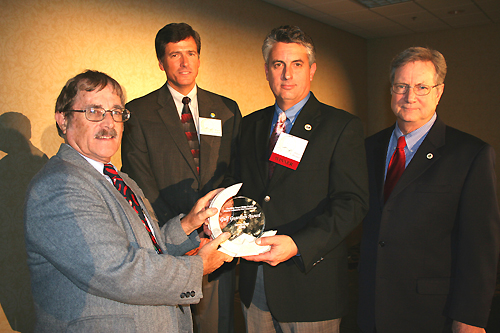 Presentation of the Gulf Guardian Award, 2nd Place, Government, to the Greater Lafourche Port Commission (Port Fourchon) for their project, "Maritime Forest Ridge Project". From left to right, pictured are Dugan Sabins, Gulf of Mexico Program Director Bryon Griffith, Davie Breaux, and EPA Region 6 Administrator Richard Greene.