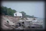 Shoreline erosion - house in shambles, Ogden Dunes Indiana