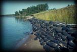 Coastal construction and protection using tires for shore protection, Port Wing, Wisconsin