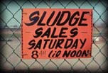 "Sludge for Sale" sign