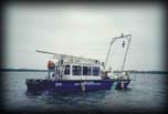 EPA vessel, "Mudpuppy" - taking samples of sediment from an area of concern (AOC)" Presque Isle Bay Lake Erie