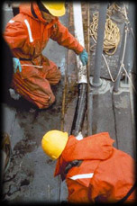 Sediment sampling aboard EPA research vessel, "Mudpuppy"