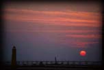 Sunset with lighthouse and cat walk, Lake Michigan Grand Haven, Michigan