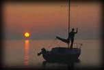 Sailboat at sunset, Lake Michigan S. Manitou Island