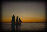 CSailing at sunset - Lucy R. Sloop, Lake Michigan Frankfort, Michigan