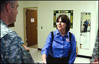 EPA On-Scene Coordinator Janice Kroone speaks with Missouri Adjutant General Stephen Danner during recovery efforts