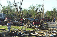 Joplin residents walk amidst the devastation