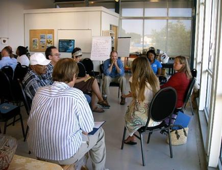 A breakout group discusses implications of sea level rise and population