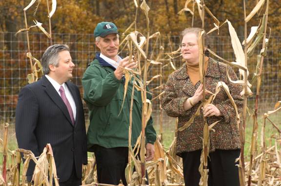 Jim Croce - CEO of NextEnergy, Professor Kurt Thelen - Michigan State University, and Deb Morrissett - Vice President of Regulatory Affairs for Chrysler [left to right], in a planting area at the Rose Township Superfund site.